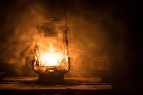 Photo of an oil lantern in smoke